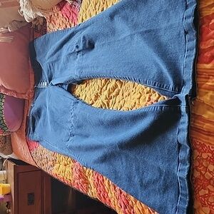 Bell bottom blue jeans, button front